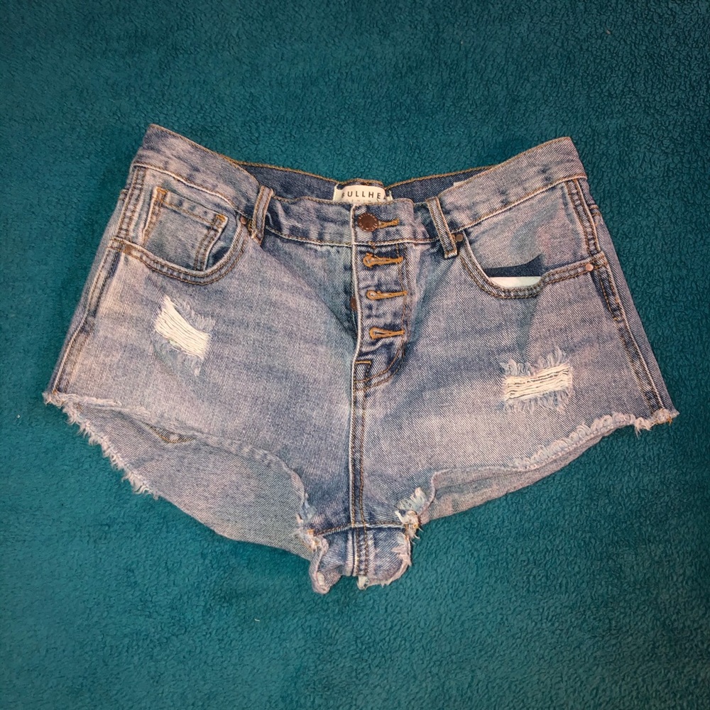 High waisted distressed button fly jean shorts